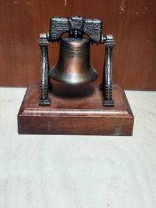 lot 127 image: Liberty Bell collectible decor.