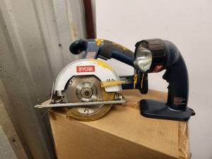 lot 201 image: Ryobi 18 volt saw and flashlight - no batteries