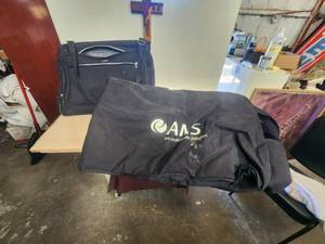 lot 162 image: Garment bag and a large duffle type bag