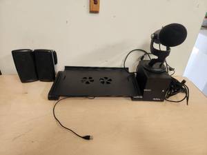 lot 163 image: Selection of computer accessories - Samsung speakers, laptop cooling station, and Startech mic