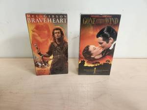 lot 178 image: Braveheart and Gone with the Wind unopened VHS movie sets.
