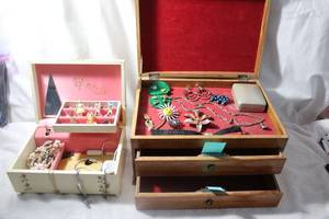 lot 113 image: Fashion jewelry selection in jewelry box. Includes brooches, pins, bracelets, Necklaces plus. Includes teal elephant pin, Sweater pin with girl figure and heart, enamel cat pins, plus. Also includes a hand-crafted carved panel wood jewelry box w keys.