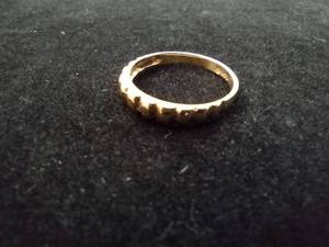 lot 103 image: 14K yellow gold ring. Marked 14K. Size 6. 1.1 gr approx.