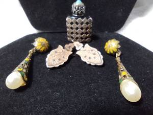 lot 111 image: Victorian jewelry selection. Includes Victorian Egyptian revival enamel earrings and a French perfume bottle with silver overlay and Turquoise accent. Stopper has attached glass wand. Marked Made in France