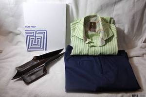 lot 38 image: Mens Dress shirt and pant, 2014 BMW door handle covers, and LSAT blueprint strategy guide