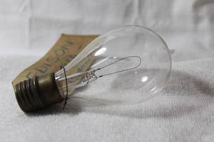 lot 4 image: Antique Edison Lightbulb - tag reads Edison 1880 Bamboo Came out of multi-generation home. Please preview