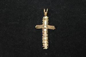lot 101 image: 14K yellow gold fully articulated cross pendant. Marked 14K. 1.75L approx. 3.5 gr approx.