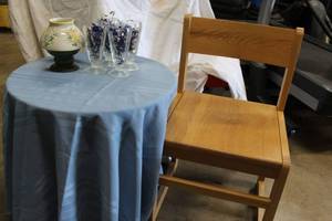 lot 133 image: Solid wood chair, side table with tablecloth, ice cream sundae glassware and candle holder