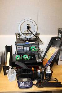 lot 28 image: Office Supplies Paper sorters (mesh and wood), Desk organizers, Brother label maker, power cord, ring light with stand (connection needs TLC - see pictures)