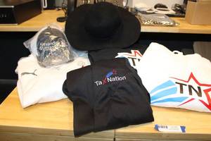 lot 45 image: Clothes and hats Black and white hoodies, Womens Jacket and a new day wide rim hat, Alexander ball cap, and Puma zip-up jacket