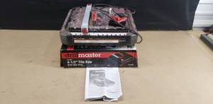 lot 50 image: Drill Master 4 12 Tile Saw, Tested