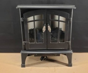 lot 51 image: Decorative Electric Space Heater, Tested and Gets HOT, 22x 20x 10