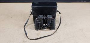 lot 94 image: Tasco 7 x 3.5 mm Binoculars