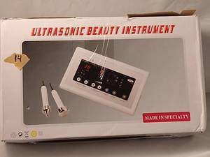 lot 25 image: ULTRASONIC BEAUTY INSTRUMENT SPECKLE REMOVING DEVICE