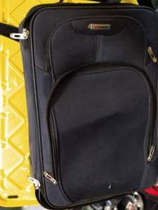 lot 77 image: TAG SUITCASE