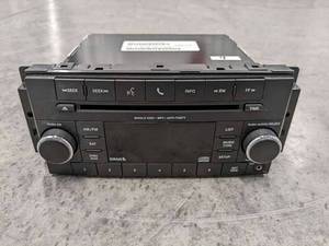lot 4 image: P68252825AC Factory 2018 Jeep Wrangler Chrysler Dodge AM FM CD Sirius Radio