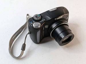lot 92 image: Canon Powershot SX100 IS 8.0 MP Digital Camera Black PC1256 10x Optical Zoom