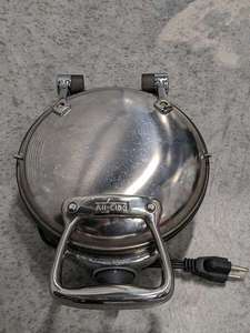 lot 108 image: All-Clad Stainless Steel Waffle Maker Model 6071