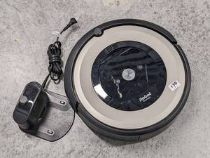 lot 130 image: iRobot Roomba E6 Vacuum Cleaning Robot w Charger