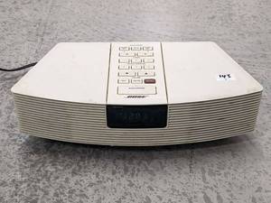 lot 143 image: Bose Wave Radio AWR1-1W Bose Acoustic Wave Clock Radio AMFM Radio