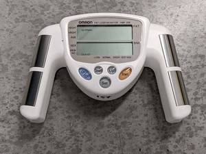 lot 157 image: Omron HBF-306 Fat Loss Monitor Handheld Body FatBMI Analyzer