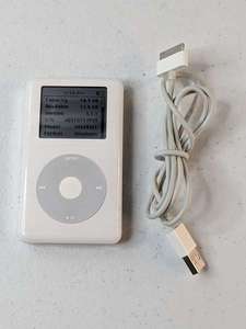 lot 210 image: Apple iPod Classic, White (20 GB) A1059 w Belt Clip Case