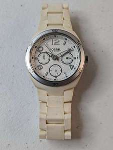 lot 223 image: Fossil Watch Women Silver Cream Tone Lucite Band Day Date ES-2520