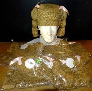 lot 22 image: NEW - PIXIE TAIL BRAIDED KNIT HATS - 6 UNITS X $