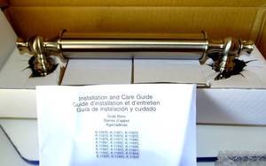 lot 53 image: NEW OPEN BOX - KOHLER POLISHED STAINLESS GRAB BAR WITH HARDWARE KIT $$$
