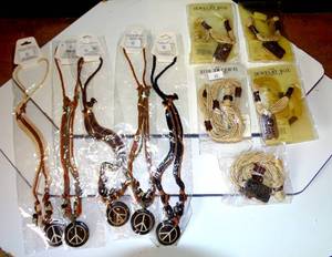 lot 74 image: NEW - ONE DOZEN ROPE NECKLACES (6 PEACE MEDALLION & 6 SAVE THE PLANET) (12X$)