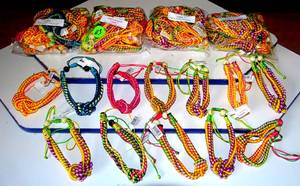 lot 113 image: NEW 5 DOZEN - BRAIDED ROPE BRACELETS - ASSORTMENT OF COLORS (60X$)