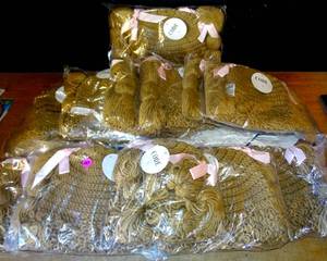 lot 269 image: NEW - PIXIE TAIL BRAIDED KNIT HATS - 12 UNITS X $