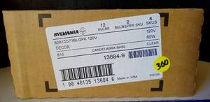 lot 300 image: NEW CASE OF 12 BULBS (6 X 2 PACKS) - Torpedo Bulb SYLVANIA 60w Candelabra Base Clear