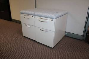 lot 32 image: (2) Rolling File cabinets with cushion top - 15W x 22D x 24H each