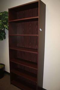 lot 40 image: 6-Shelf Cherry colored bookcase - 7H x 3W x 1D
