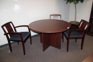 lot 41 image: Cherry colored 47 Round table (29.5H) and 3 chairs as shown