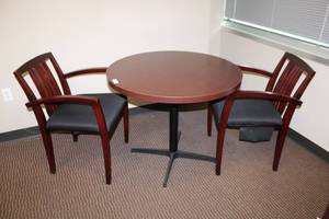lot 66 image: 3 Round cherry colored table with 2 mission style chairs
