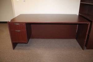 lot 79 image: Cherry colored Desk by National with key