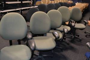 lot 102 image: (5) Green rolling office chairs