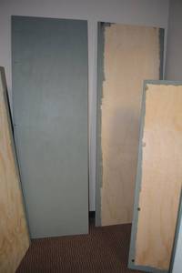 lot 133 image: Partially Painted 12 Plywood - (4) 26x65.5, (2) 29x73.5 some have magnets glued to them