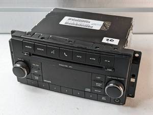 lot 20 image: Jeep Chrysler 08-13 AM FM Stereo mp3 CD Sirius Radio Part Number P05091228AD