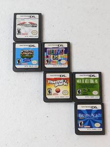 lot 24 image: Lot of 6 - Assorted Nintendo DS Games Mario Kart, Harvest Moon, Tetris, Theme Park, Where The Wild Things Are, Brain Age 2