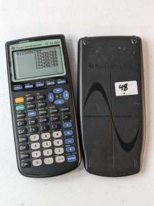 lot 48 image: Texas Instruments TI-83 Plus Graphing Calculator with Cover