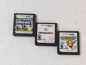 lot 90 image: Lot of 3 - Nintendo DS Games New Super Mario Bros, FIFA Soccer 09, Drawn to Life
