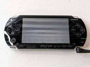 lot 91 image: Sony PlayStation Portable PSP-1001 w Charger - No Battery