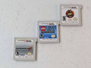 lot 111 image: Lot of 3 - Nintendo 3DS Games Mario Kart 7, NBA All Stars Top Trump, Lego City Undercover