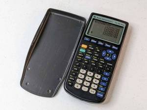 lot 114 image: Texas Instruments TI-83 Plus Graphing Calculator wCover