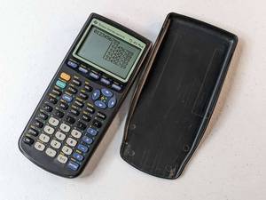 lot 147 image: Texas Instruments TI-83 Plus Graphing Calculator