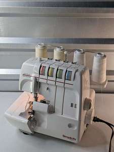 lot 157 image: Simplicity Sl4390ed Serger Thread Sewing Machine with foot pedal