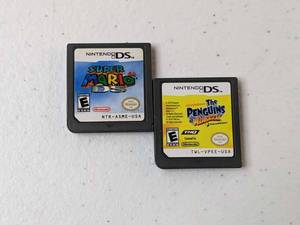 lot 196 image: Lot of 2 - Nintendo DS Games Super Mario 64, The Penguins of Madagascar